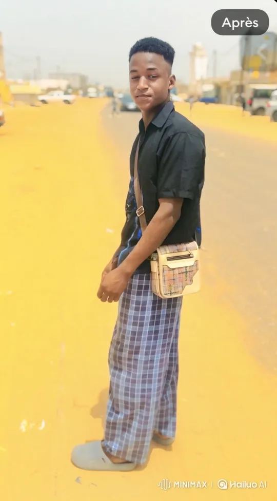 Young Man Prepares to Ride Motorcycle on Dusty Road – AI Generated Video | Hailuo AI