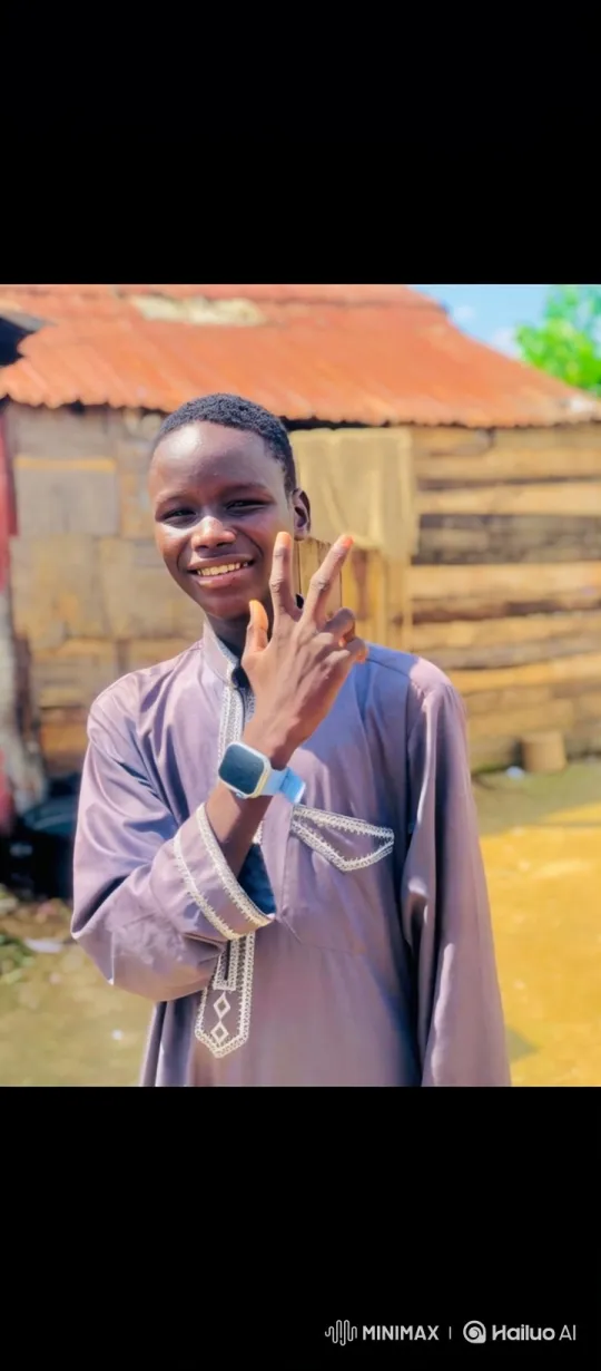 Young Man in Embroidered Tunic Greeting with Smile – AI Generated Video | Hailuo AI
