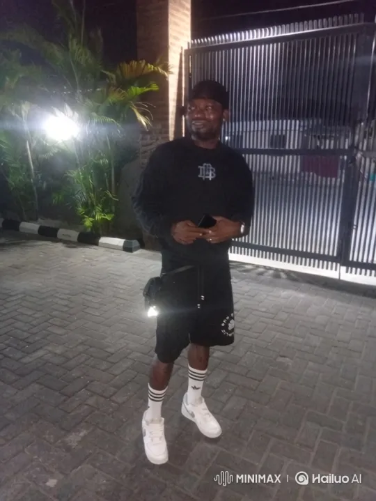 Nighttime Stroll of a Man in Herringbone Patterned Area – AI Generated Video | Hailuo AI