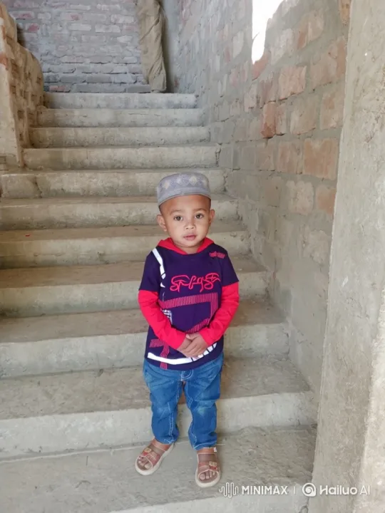 Young Boy's Subtle Smiles Captured on Camera – AI Generated Video | Hailuo AI