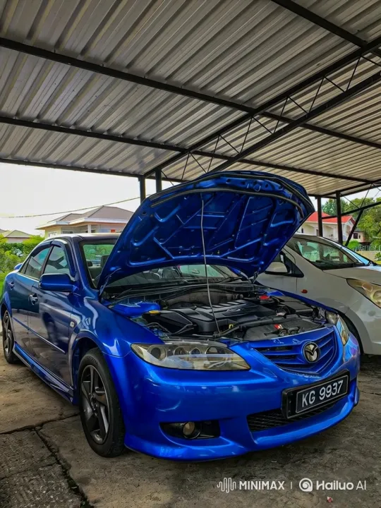 Blue Mazda Sedan Showcases Air Suspension Lowering – AI Generated Video | Hailuo AI