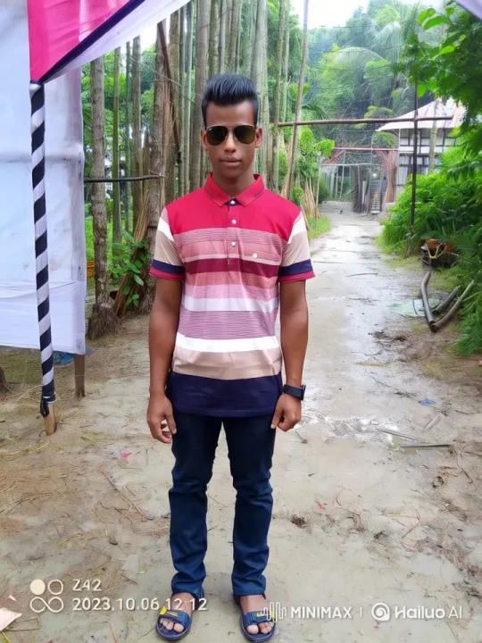 Young Man in Stylish Attire on Serene Path – AI Generated Video | Hailuo AI