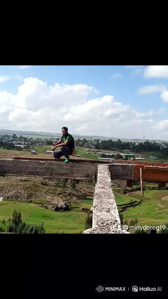 Man Watches Airplane Fly Over Valley at Construction Site – AI Generated Video | Hailuo AI