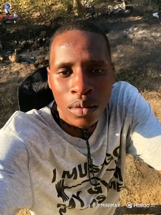 Young Man in Calm Stance Amidst Outdoor Setting – AI Generated Video | Hailuo AI