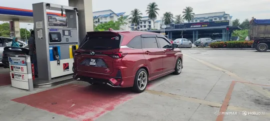 Red Minivan Lowers Gracefully at Petron Station – AI Generated Video | Hailuo AI