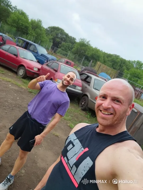 Bald Man and Friend Dance Joyfully in Car Lot – AI Generated Video | Hailuo AI