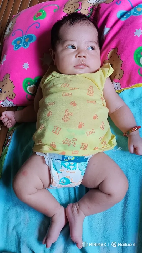 Baby Joyfully Dancing on a Soft Blanket – AI Generated Video | Hailuo AI