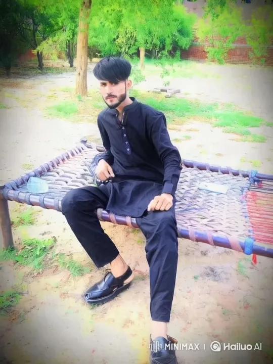 Young Man Reflects in Serene Outdoor Setting – AI Generated Video | Hailuo AI