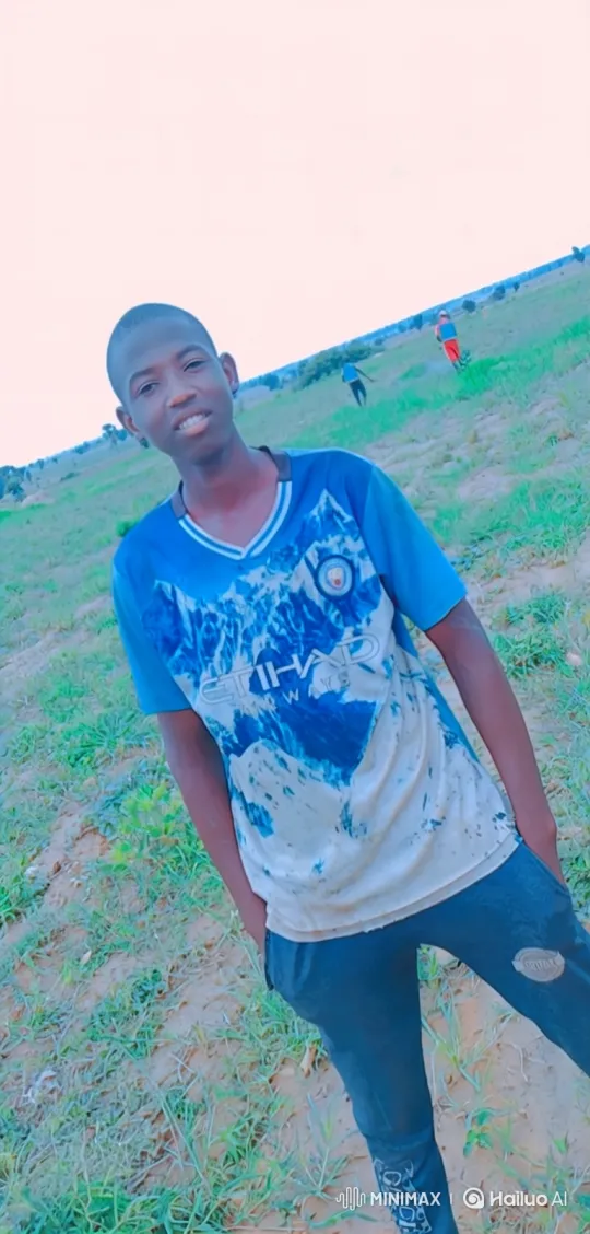Young Man in Serene Landscape with Gentle Smile – AI Generated Video | Hailuo AI