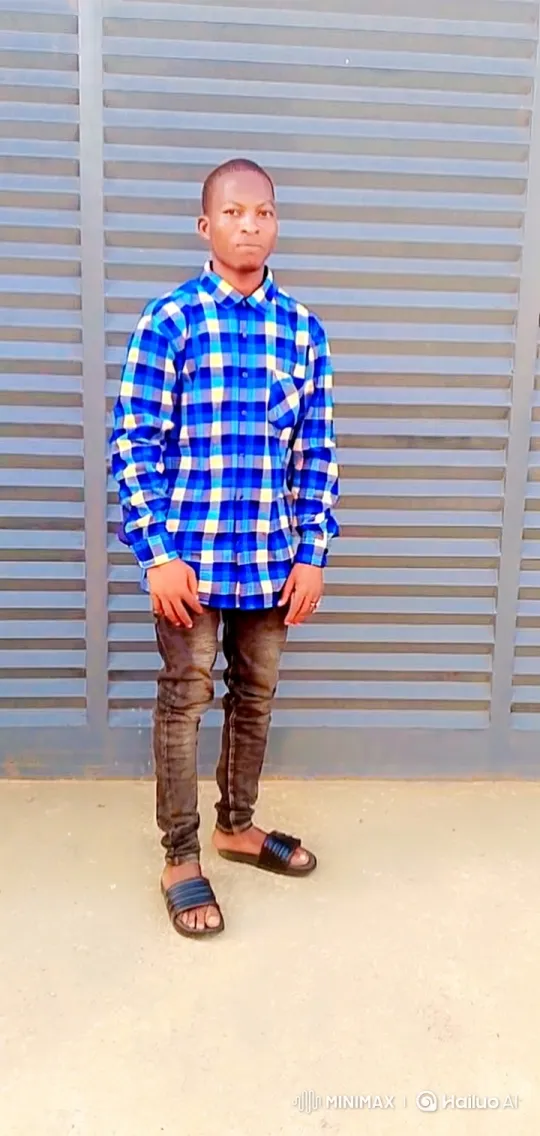 Young Man Smiles Gently in Close-Up Video – AI Generated Video | Hailuo AI