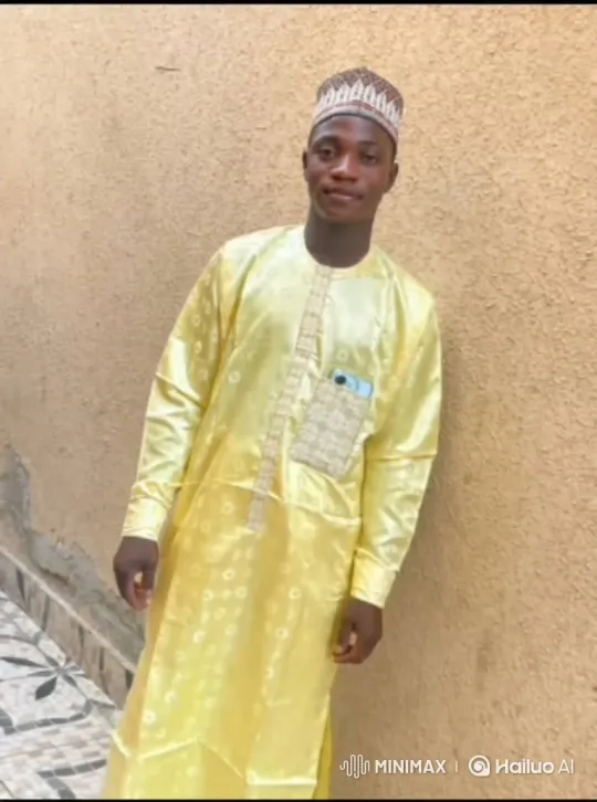 Young Man in Traditional Attire Displaying Gentle Grace – AI Generated Video | Hailuo AI