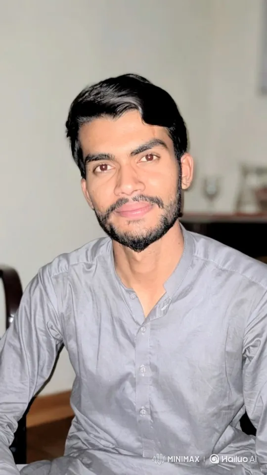 Young Man in Subtle Gaze and Gentle Smile – AI Generated Video | Hailuo AI