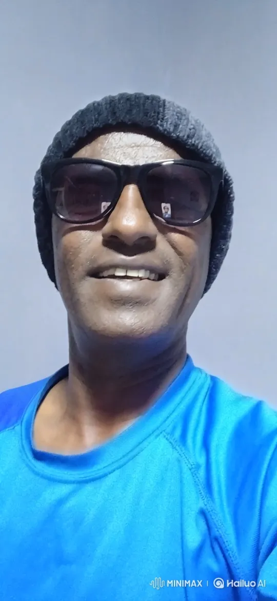 Man Smiles Warmly in Tracking Shot Video – AI Generated Video | Hailuo AI