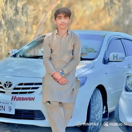 Young Man in Long-Sleeved Tunic in Front of White Car – AI Generated Video | Hailuo AI