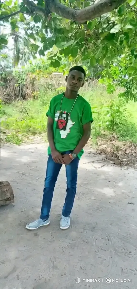 Young Man in Green Shirt Walks Through Woods – AI Generated Video | Hailuo AI