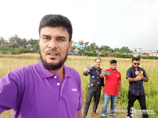 Four Men in a Field Taking Selfies – AI Generated Video | Hailuo AI