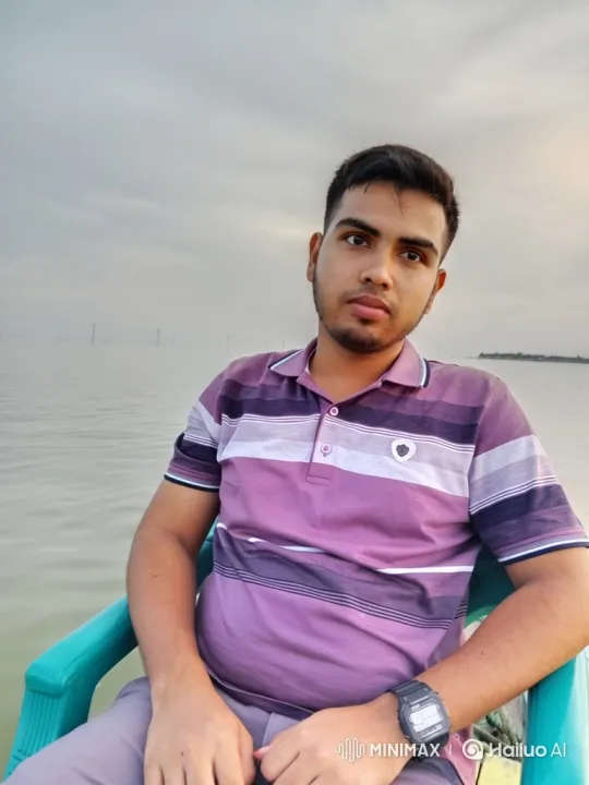 Man in Boat Reflects on Vast Calm Waters – AI Generated Video | Hailuo AI