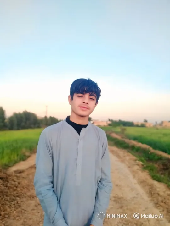 Young Man Smiles Gently in Golden Hour Countryside – AI Generated Video | Hailuo AI