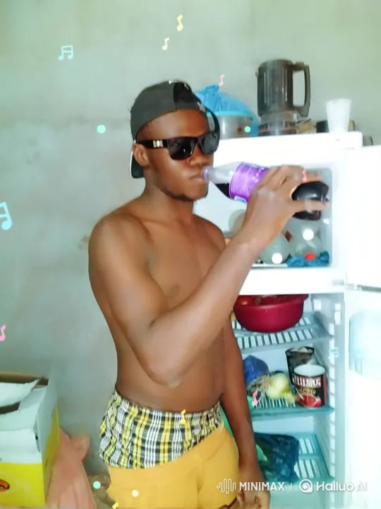 Young Man Enjoying Refreshing Beverage from Refrigerator – AI Generated Video | Hailuo AI