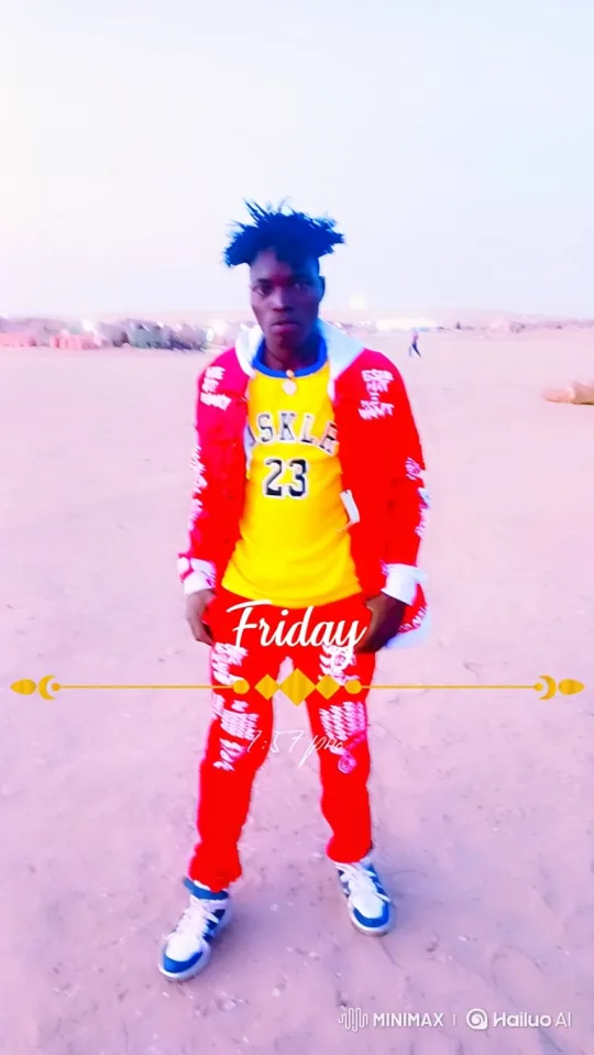 Young Man in Vibrant Outfit Stands Confidently in Twilight Landscape – AI Generated Video | Hailuo AI