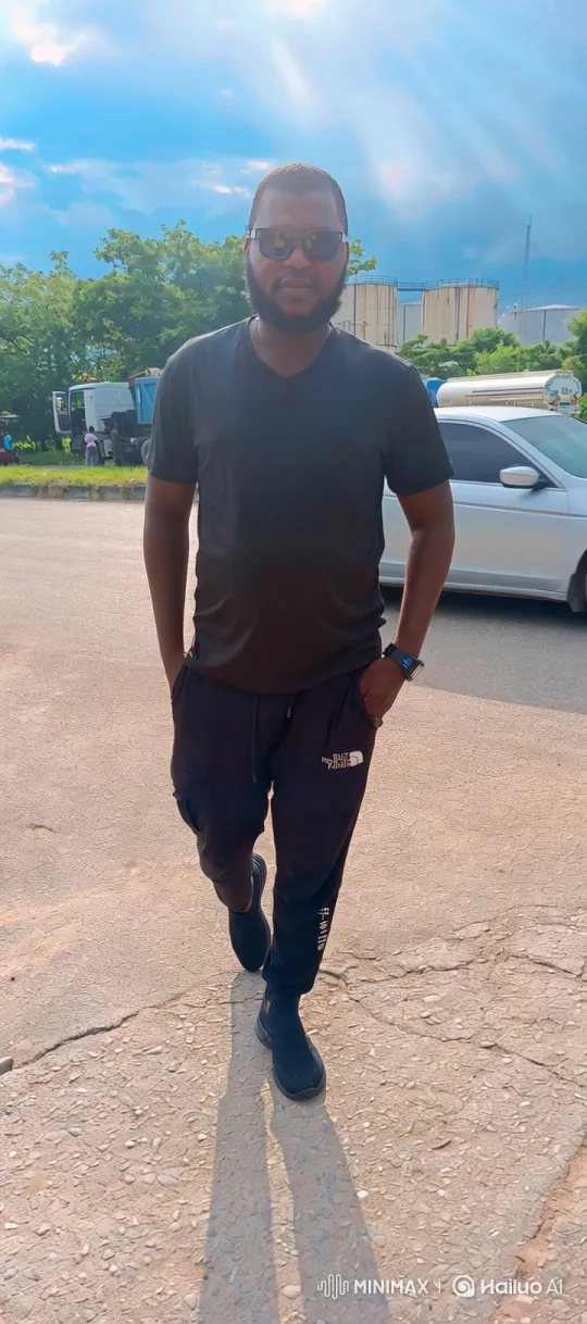 Man Walks Confidently Toward Camera on Sunny Day – AI Generated Video | Hailuo AI