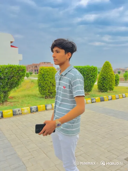 Young Man Strolls Through Landscaped Area – AI Generated Video | Hailuo AI