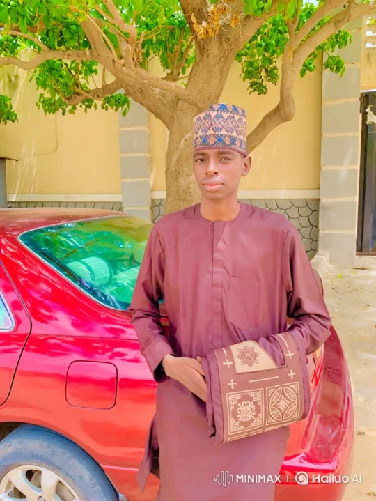 Young Man in Maroon Tunic with Mat at Tree Background – AI Generated Video | Hailuo AI