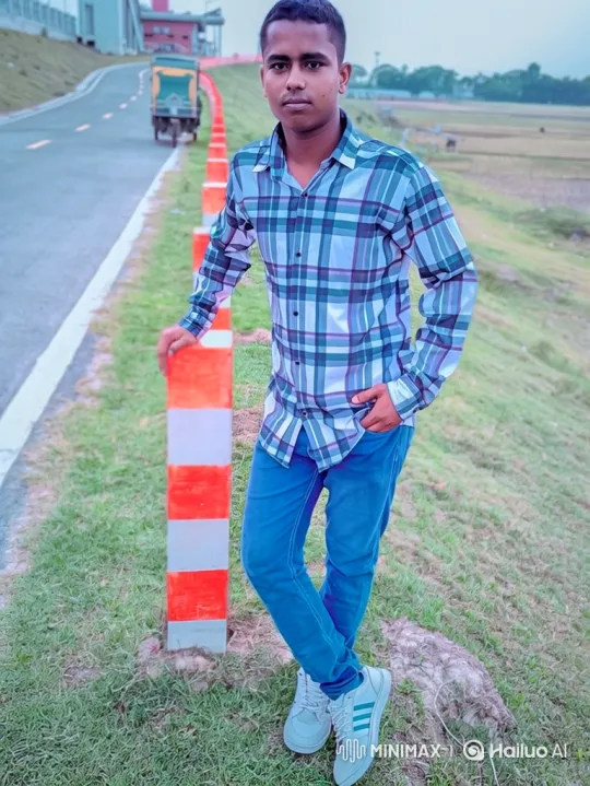 Young Man on Embankment with Gentle Breeze – AI Generated Video | Hailuo AI