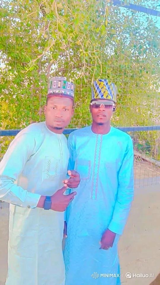 Two Men in Tunics Enjoy a Gentle Breeze Outdoors – AI Generated Video | Hailuo AI