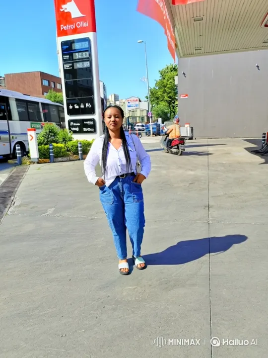 Woman enters car at gas station, drives away. – AI Generated Video | Hailuo AI