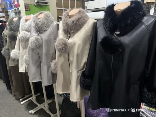 Winter Coats Display with Black, Cream, and Grey Options – AI Generated Video | Hailuo AI