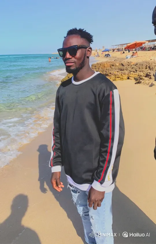 Young Black Man Strolls Along Sunlit Beach – AI Generated Video | Hailuo AI