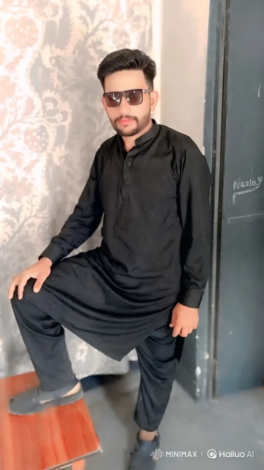 Young Man in Black Poses and Transitions Smoothly – AI Generated Video | Hailuo AI