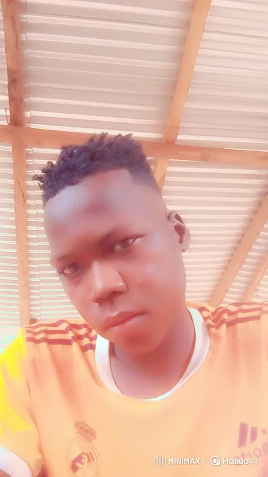 Young Black Man Maintains Calm Gaze in Intimate Video Scene – AI Generated Video | Hailuo AI