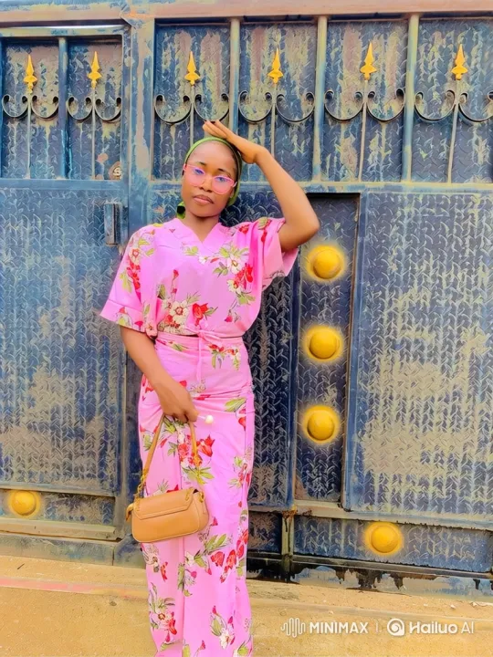 Stylish Young Woman Poses by Ornate Blue Gate – AI Generated Video | Hailuo AI