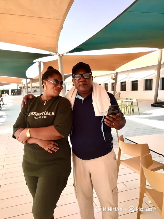 Couple Meets Friends, Exits in SUV from Patio Setting – AI Generated Video | Hailuo AI