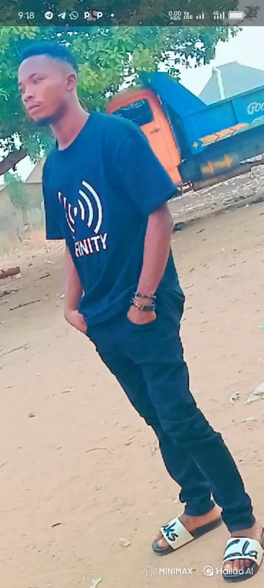 Young Man in Thoughtful Stance by Parked Truck – AI Generated Video | Hailuo AI