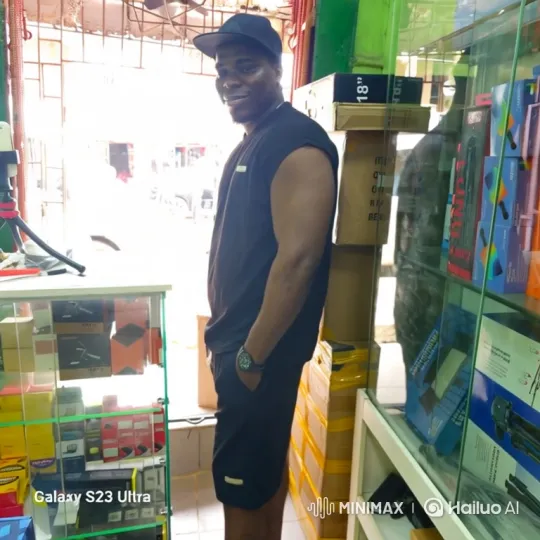 Young Man Walking in Electronics Store – AI Generated Video | Hailuo AI