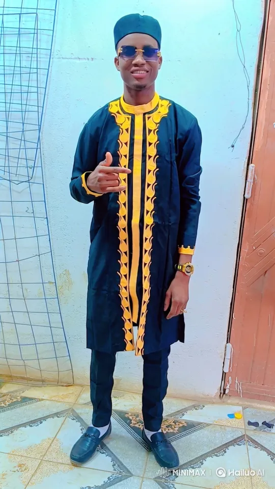 Young Man in Stylish Blue Ensemble Welcomes Viewers – AI Generated Video | Hailuo AI