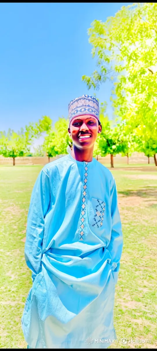 Young Man Strolls Through Park with a Smile – AI Generated Video | Hailuo AI