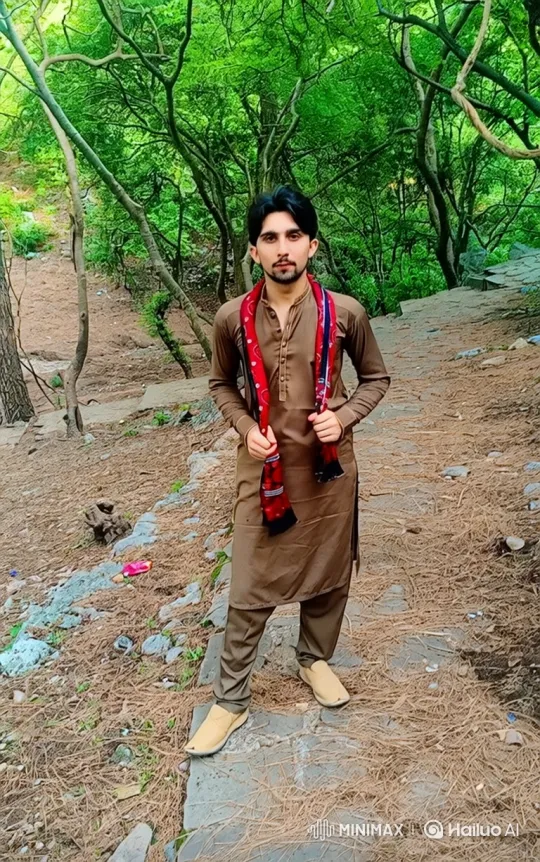 Young Man in Forest with Calm Expression – AI Generated Video | Hailuo AI