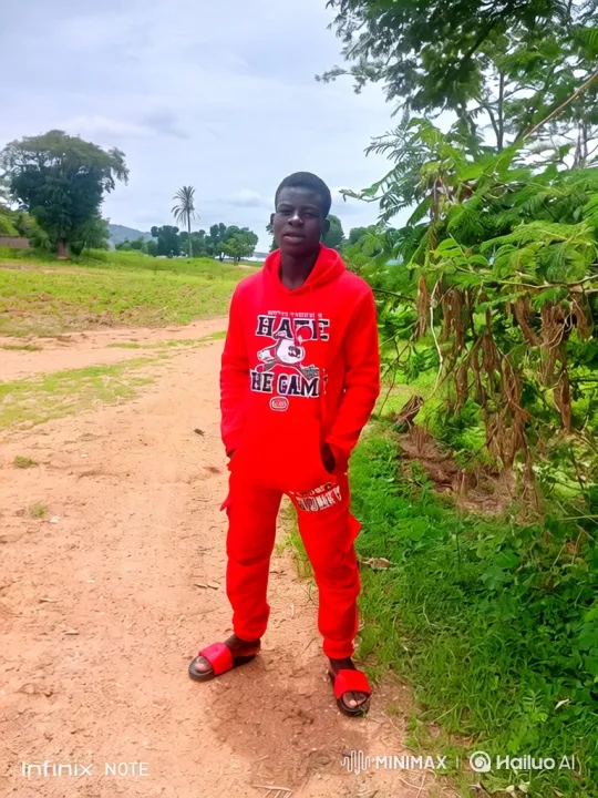 Young Man in Red Tracksuit on Dirt Path with Complex Camera Tracking – AI Generated Video | Hailuo AI