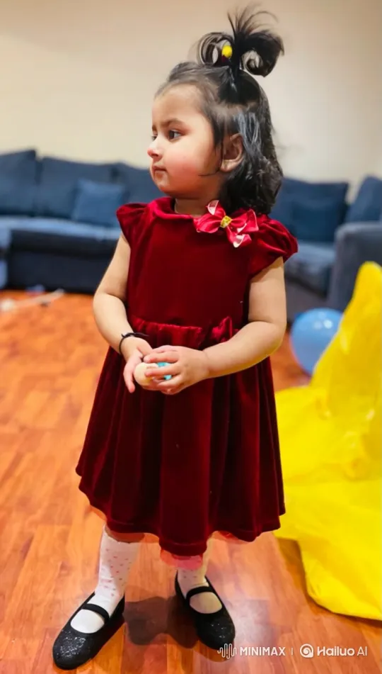 Charming Girl in Velvet Dress Plays with Toy at Park – AI Generated Video | Hailuo AI