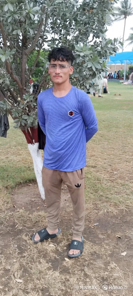 Young Man in Park, Calm and Observant – AI Generated Video | Hailuo AI