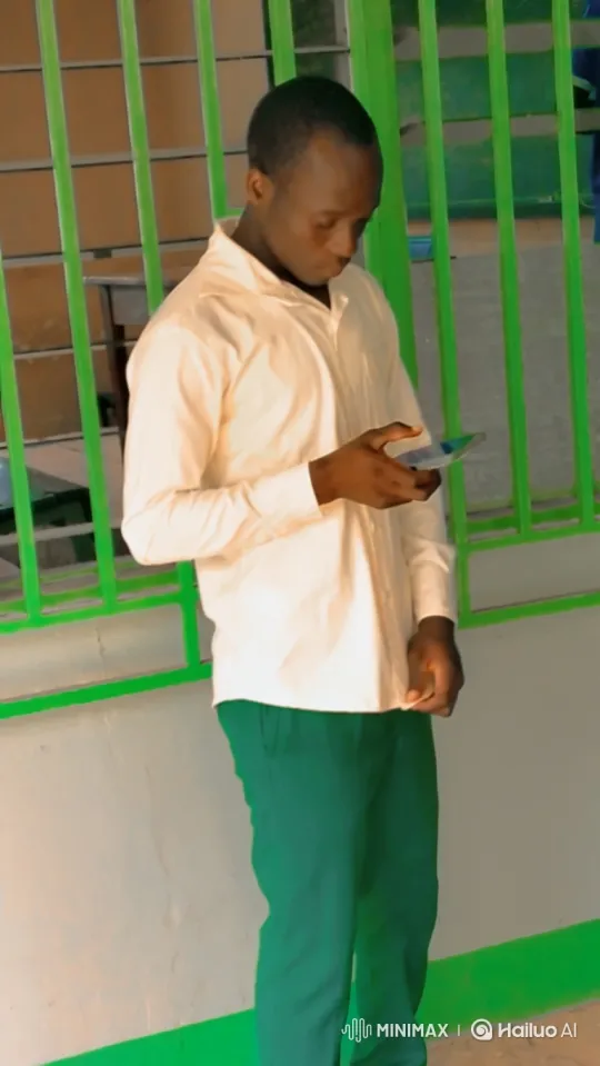 Young Man Focused on Smartphone Screen – AI Generated Video | Hailuo AI