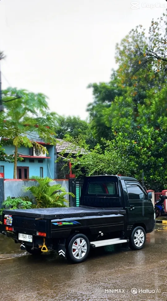 Custom Black Pickup Truck Lowers Its Body on Wet Road – AI Generated Video | Hailuo AI