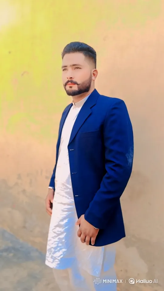 Man in Royal Blue Blazer: A Study in Grace and Gaze – AI Generated Video | Hailuo AI