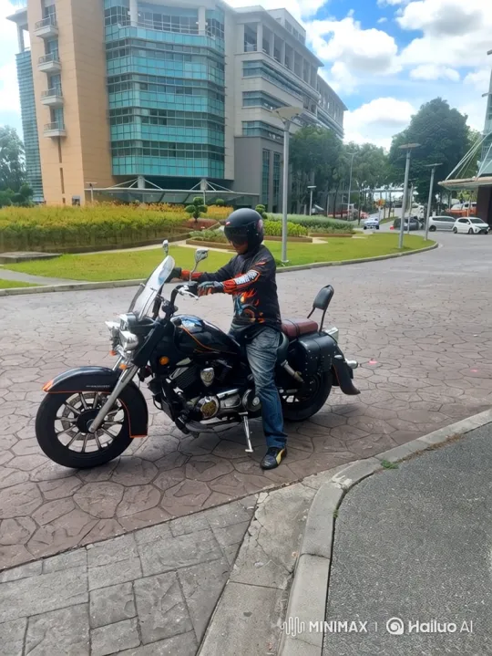 Motorcyclist Performs Wheelie on Cobblestone Driveway – AI Generated Video | Hailuo AI
