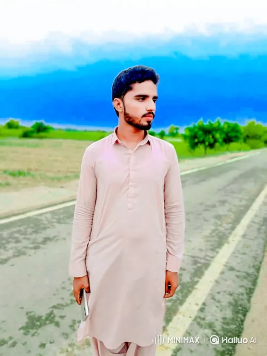 Contemplative Young Man on Country Road – AI Generated Video | Hailuo AI