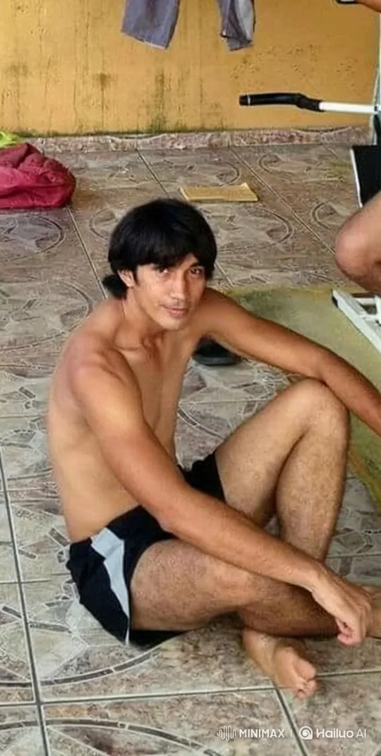 Young Man Smiling Gently in Static Shot – AI Generated Video | Hailuo AI